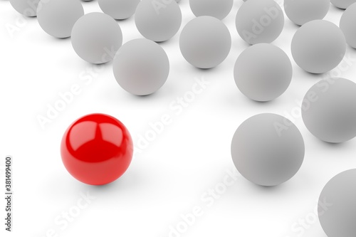 Single red ball standing out from the crowd of white spheres  leadership  standing out or bravery concept over white background