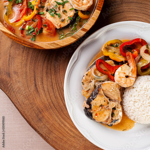 .Typical dish of Brazilian cuisine called Moqueca de Peixe com camarão. Top view