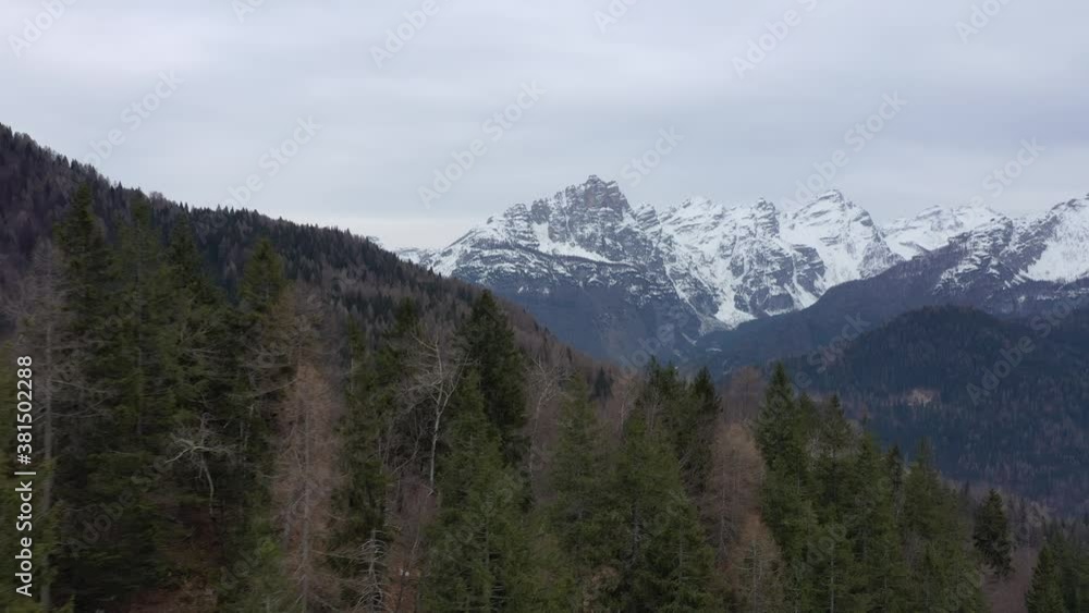 aerial snow covered mountain peaks in alps at winter aerial snow covered mountain peaks in alps at winter