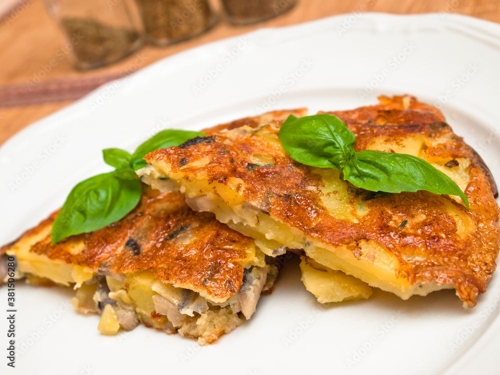 Spanish tortilla with mushrooms and basil