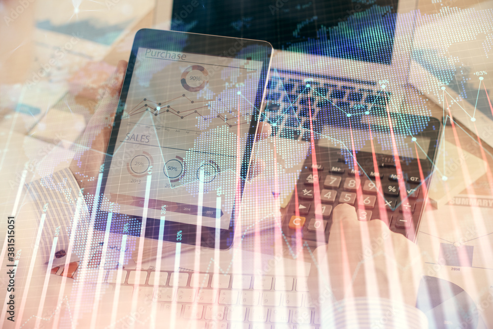 Double exposure of man's hands holding and using a digital device and forex graph drawing. Financial market concept. Double exposure of man's hands holding and using a digital device and forex graph drawing. Financial market concept.