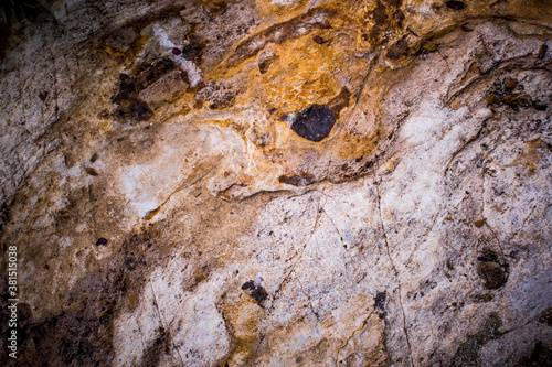 Vignetting of the structure of the surface of the Stone. The idea for texture background. Natural rocks closeup shot.