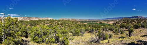 Escalante Petrified Forest State Park views from hiking trail of the surrounding area, lake and trees. Utah. United States.