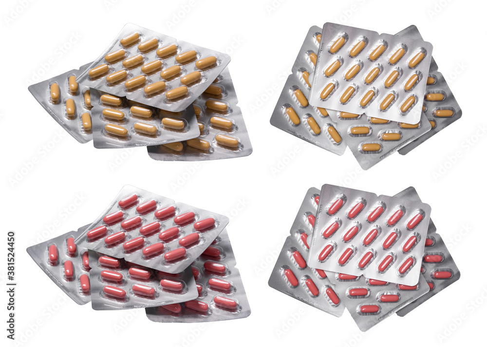 Obraz premium Set of multicolored pills isolated on white background