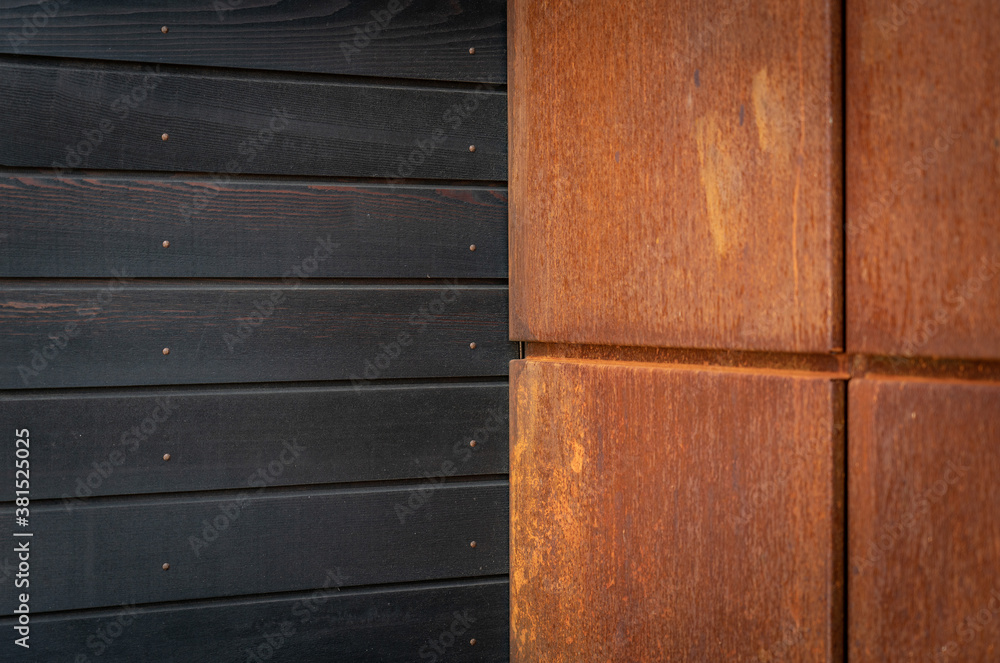 Rusty Coreten steel and charred cedar house cladding Rusty Coreten steel and charred cedar house cladding