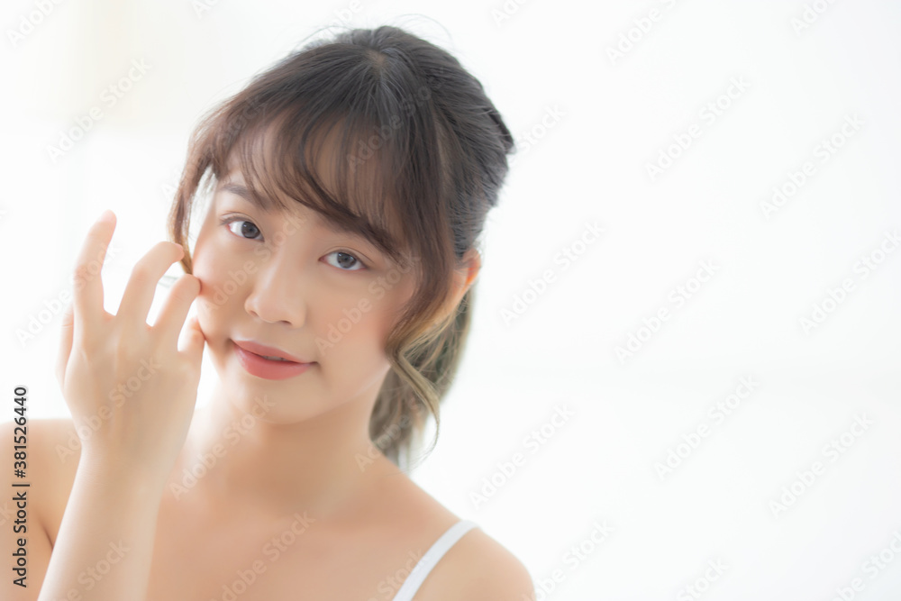 Portrait of beautiful young asian woman smile healthy and wellness at the bedroom, beauty asia girl skin care touch eye makeup and cosmetic with happy with fresh, lifestyle and relax concept. Portrait of beautiful young asian woman smile healthy and wellness at the bedroom, beauty asia girl skin care touch eye makeup and cosmetic with happy with fresh, lifestyle and relax concept.