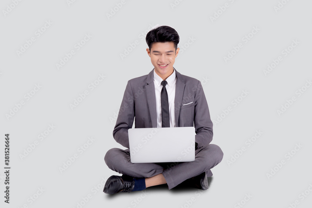 Young asian business man sitting work on laptop computer to internet online isolated on white background, businessman confident and notebook, freelance with success, marketing and communication. Young asian business man sitting work on laptop computer to internet online isolated on white background, businessman confident and notebook, freelance with success, marketing and communication.
