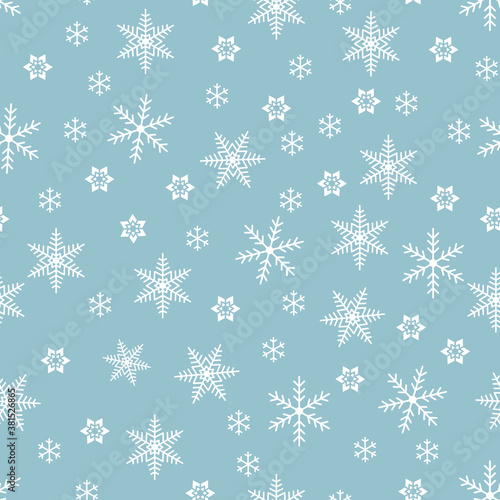 Christmas winter white snowflake seamless pattern on blue