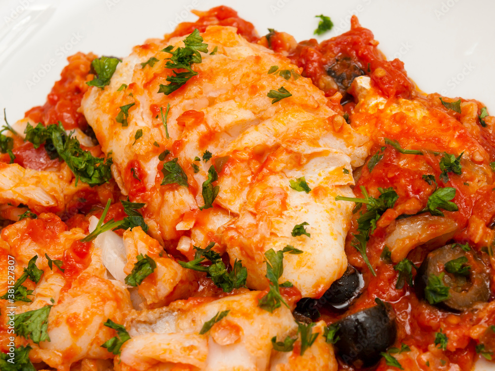 Baccalà alla napoletana - neapolitan cod with tomato sauce Baccalà alla napoletana - neapolitan cod with tomato sauce