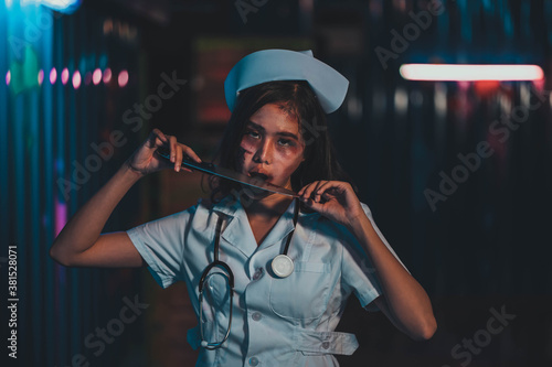 Horror scary evil insane nurse doctor held the knife  Zombie woman gosth with halloween concept