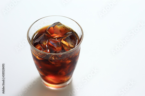 glass of iced coffee on white background