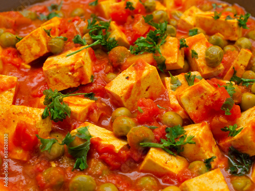 Vegan tofu and green peas curry
