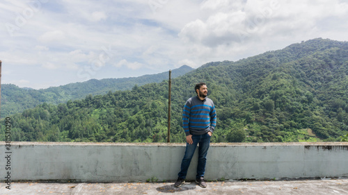 Man enjoying mountain view in San Juancito Fracismo Morazan Honduras Central America