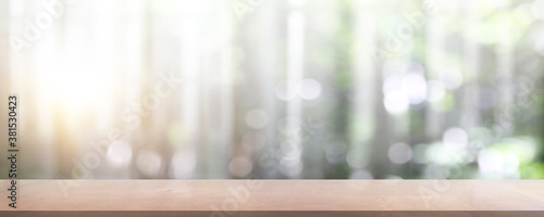 Nature background  Wood table display over blur green garden