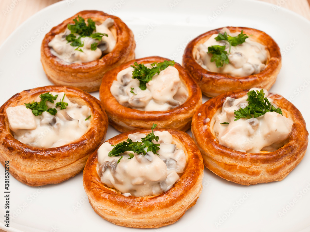 Vol-au-vent - puff pastry filled with chicken and mushrooms ragout Vol-au-vent - puff pastry filled with chicken and mushrooms ragout