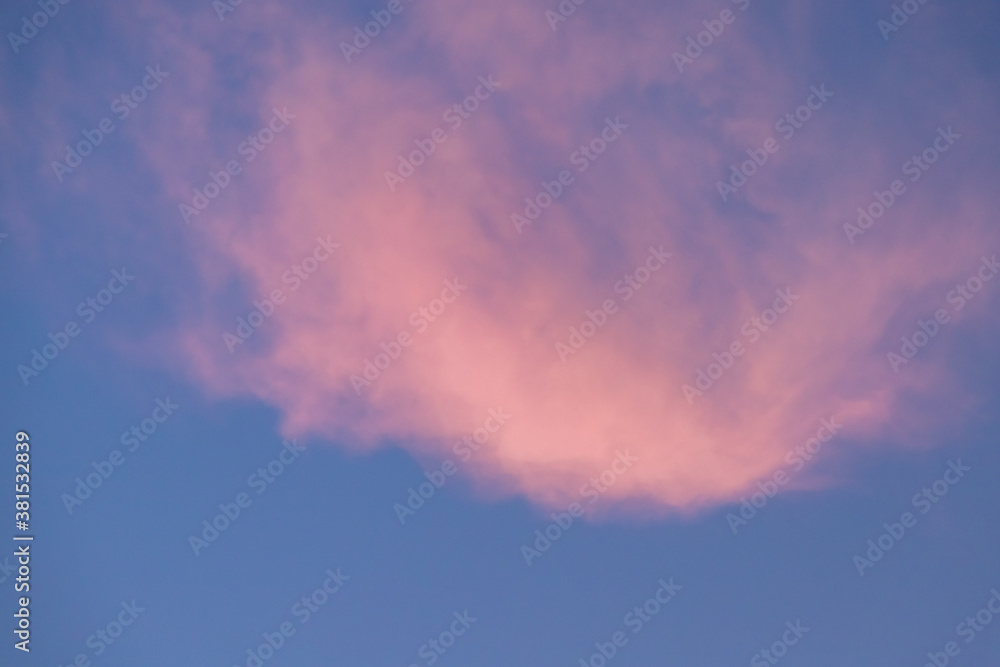 sky and cloud in bright rainbow at sunset