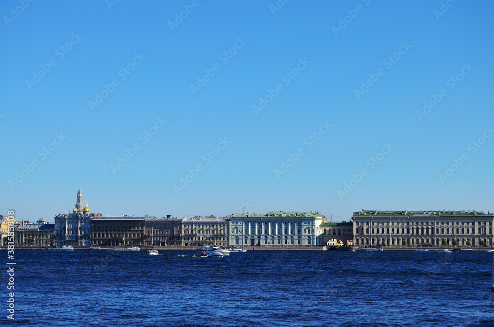 St. Petersburg view of the Hermitage from the Neva River, clear blue sky, river tours on a boat