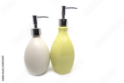 Modern shower gel bottle on white background