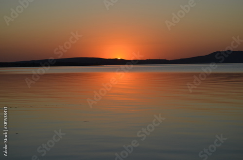 sunset over the sea © Mehmet