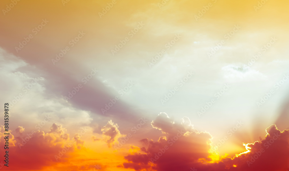 sky and clouds nature background,red light on clouds and bright yellow sun light on colorful sky