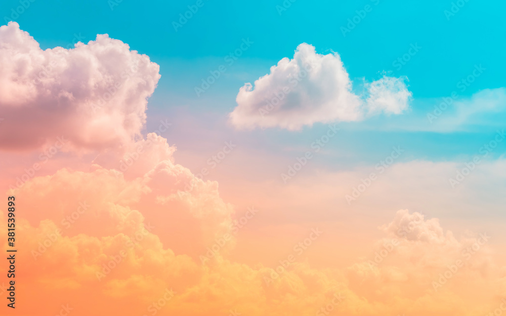 orange and pink clouds in blue sky with clouds