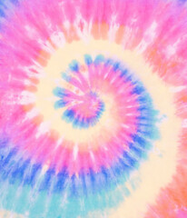 Spiral tie dye wallpaper. Swirl tiedye background in pink blue and green. Boho hippie tie-dye pattern.