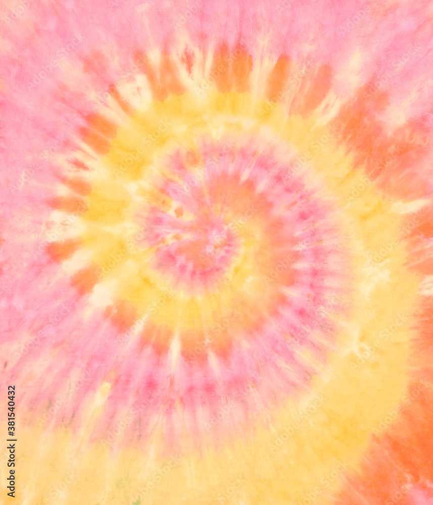 Spiral tie dye background. Swirl tie-dye pattern. Hippie boho circular  tiedye wallpaper in orange yellow. Stock Illustration