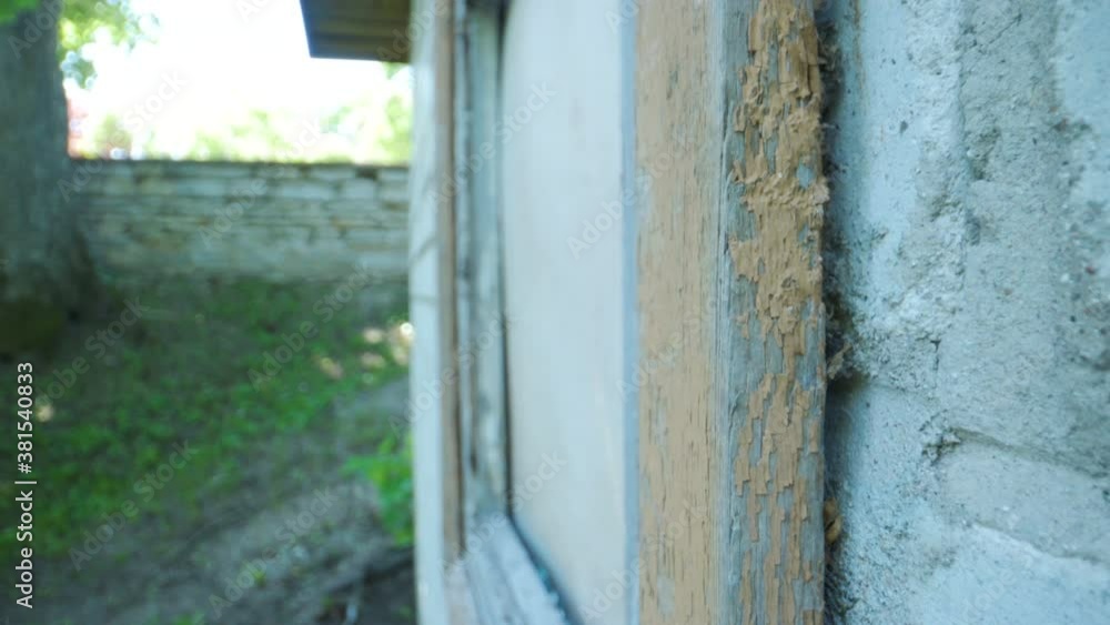 A closer look of the peeling paint of the wall A closer look of the peeling paint of the wall