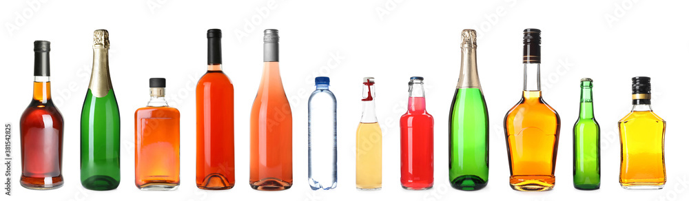 Set of bottles with different liquids on white background. Banner design Set of bottles with different liquids on white background. Banner design