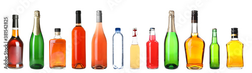 Set of bottles with different liquids on white background. Banner design