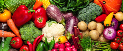 Many fresh different vegetables as background, top view. Banner design