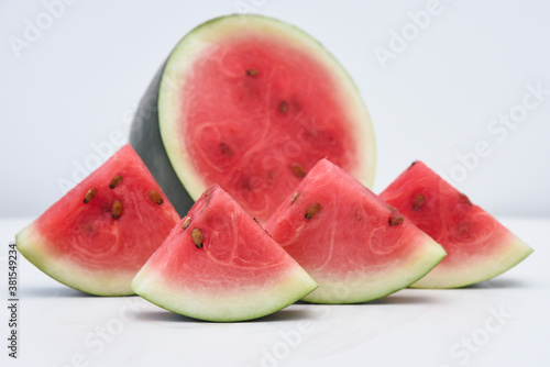 Food art with fresh red ripe watermelon for making drink / juice, slices of kiran India. Healthy refreshing  drink for hot Indian summer. Reduce the body heat, cool drinks
