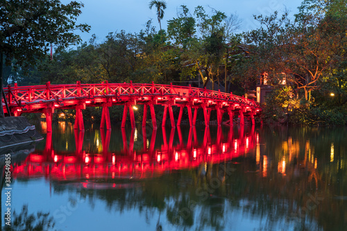 Red Bridge- The Huc Bridge in Hoan Kiem Lake, center of Hanoi, Vietnam photo