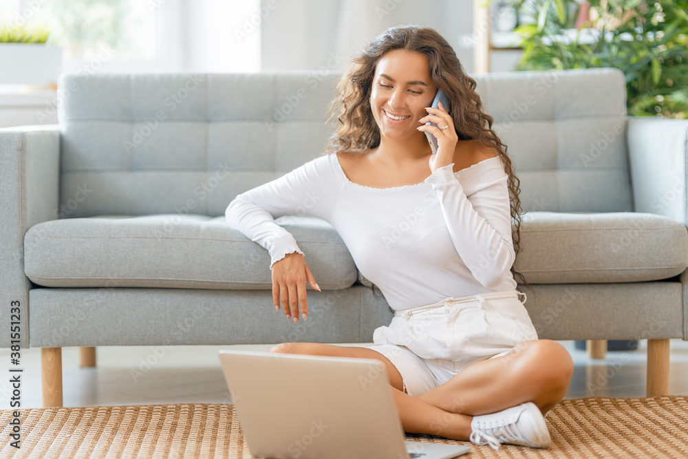 Young woman is using laptop Young woman is using laptop