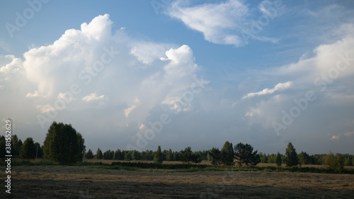 Cloudy sky over farmland