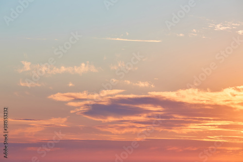Beautiful evening sky in pink colours. Golden hour or sunset over sea. Virgin nature and seascape concept, copy space