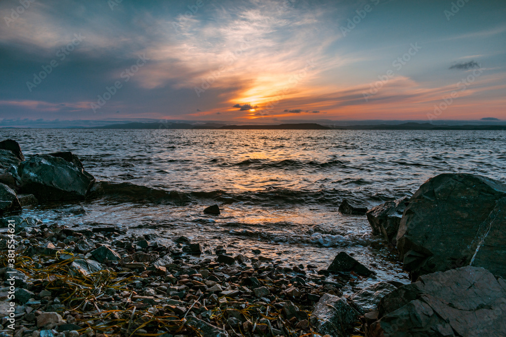 Fototapeta premium Sunset on the rocky seashore