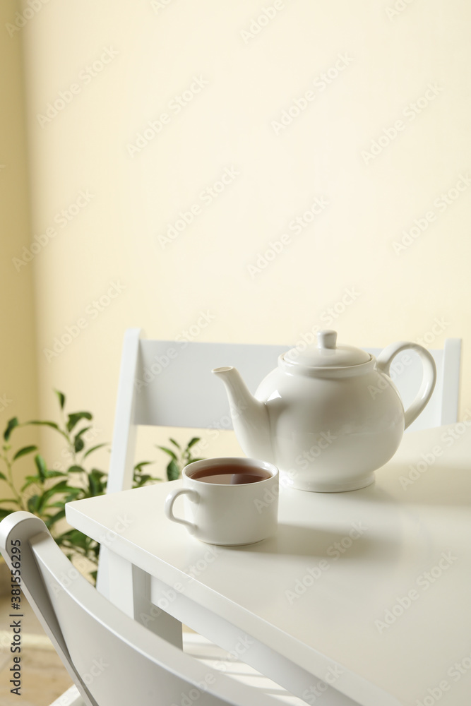 Concept of breakfast with tea on white table Concept of breakfast with tea on white table
