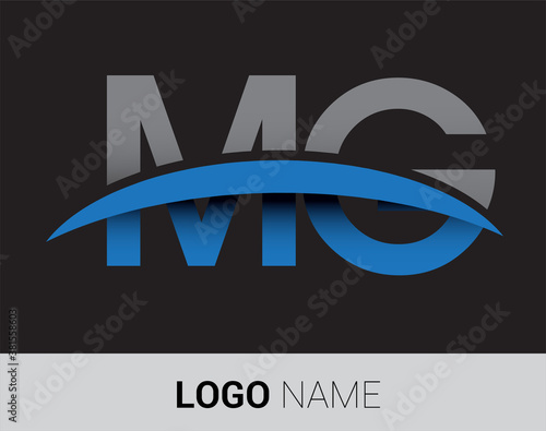 MG initial logo company name colored grey and blue swoosh design.