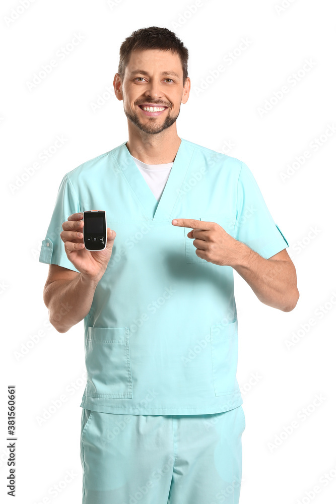 Doctor with digital glucometer on white background. Diabetes concept Doctor with digital glucometer on white background. Diabetes concept