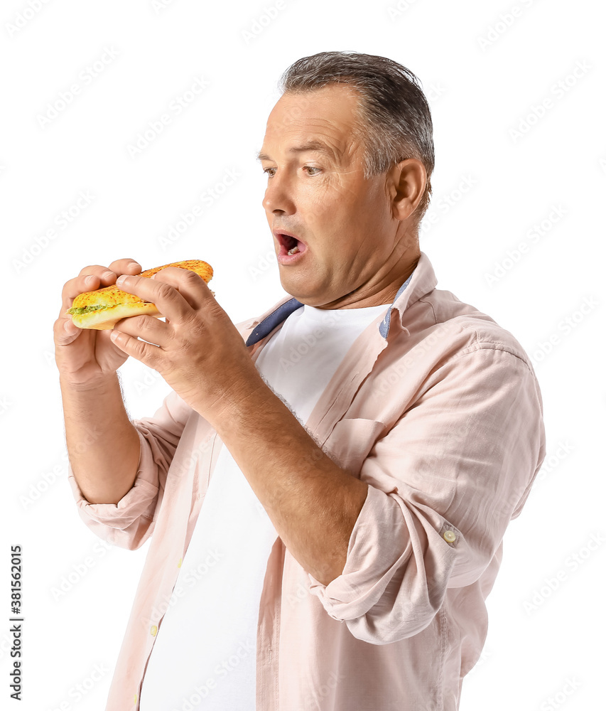Mature man with problem of strong hunger on white background. Diabetes symptoms Mature man with problem of strong hunger on white background. Diabetes symptoms