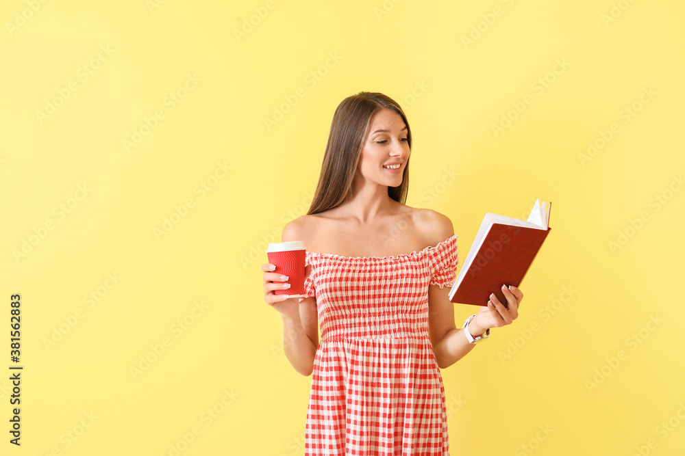Beautiful young woman with book and coffee on color background Beautiful young woman with book and coffee on color background