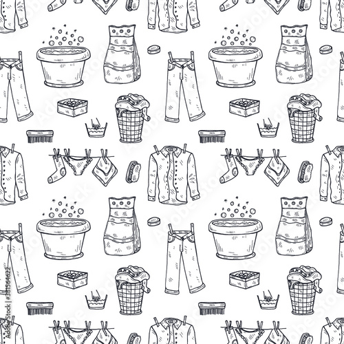 Seamless pattern with hand drawn laundry icons. Collection of sketched objects.  Home laundry service. Accessories for washing and drying clothes