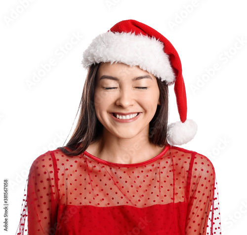 Happy young woman in Santa ...