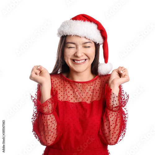 Happy young woman in Santa ...