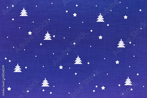Blue Christmas background with white painted Christmas trees and stars. New year's invitation, greeting card, booklet