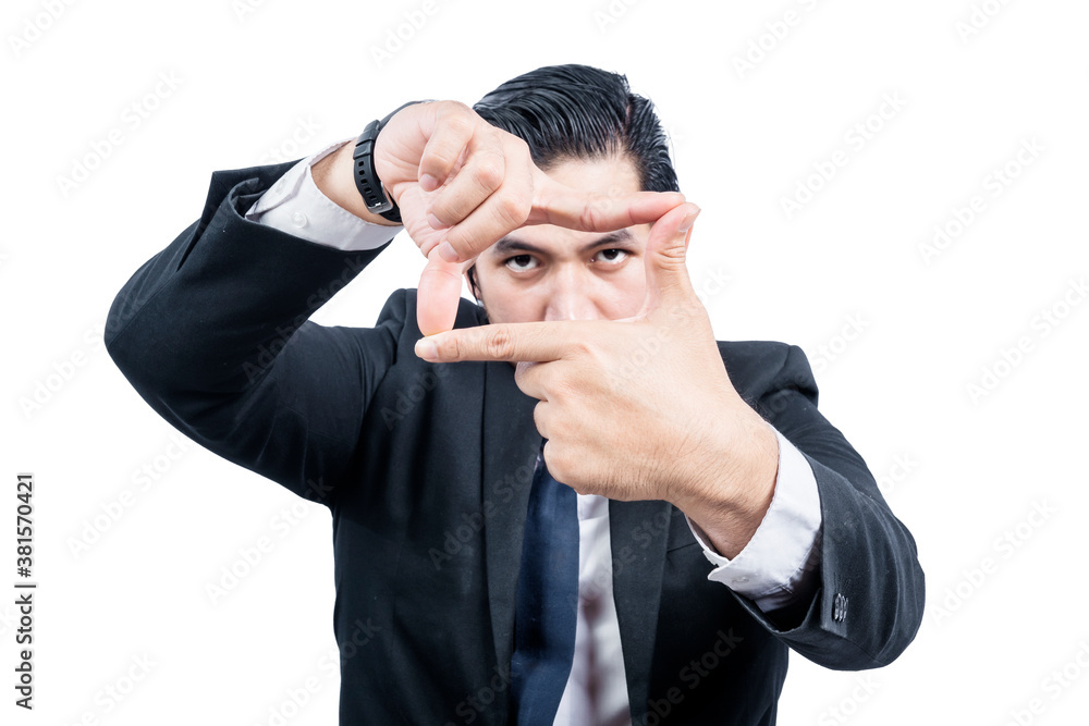Asian businessman making frame with his hands Asian businessman making frame with his hands