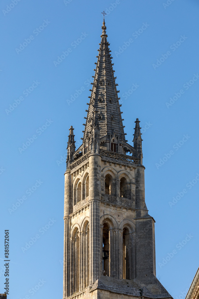   Bell tower of  Monolithic Church in Saint Emilion. France.  St Emilion is French village famous for the excellent red wine.