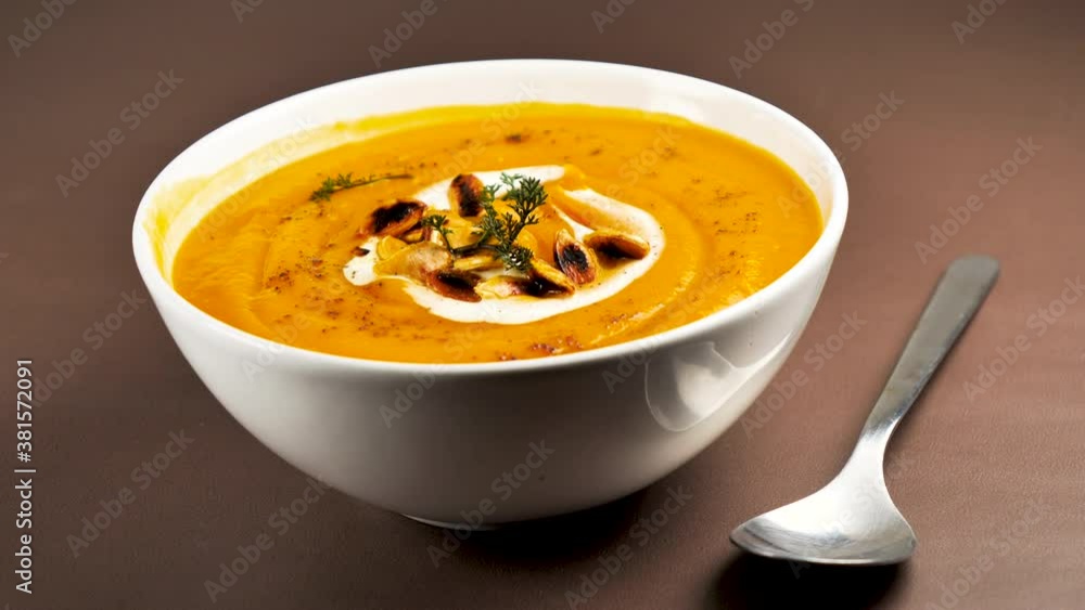 bowl of vegetable soup and cream bowl of vegetable soup and cream
