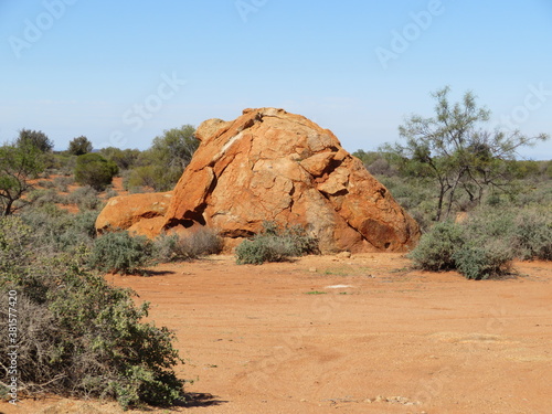 breaking up granite boulder at Chinaman Rock in Western Australia